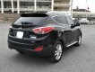 Hyundai Tucson 2.0 AT.  2011 - Cần bán lại xe Hyundai Tucson 2.0 AT. Sản xuất năm 2011, màu đen, xe nhập
