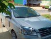 Daewoo Gentra   2009 - Bán Daewoo Gentra đời 2009, màu bạc xe gia đình, giá 165tr