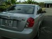 Chevrolet Lacetti 1.6 2011 - Cần bán xe Chevrolet Lacetti 1.6 đời 2011, màu bạc như mới