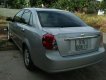 Chevrolet Lacetti 1.6 2011 - Cần bán xe Chevrolet Lacetti 1.6 đời 2011, màu bạc như mới