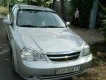 Chevrolet Lacetti 1.6 2011 - Cần bán xe Chevrolet Lacetti 1.6 đời 2011, màu bạc như mới