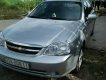 Chevrolet Lacetti 1.6 2011 - Cần bán xe Chevrolet Lacetti 1.6 đời 2011, màu bạc như mới