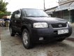 Ford Escape XLT 2003 - Cần bán Ford Escape XLT 4x4 10/2003, màu đen, chính chủ sử dụng