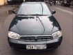 Kia Spectra LS 2004 - Cần bán gấp Kia Spectra LS 2004, màu đen, xe nhập, số sàn