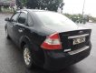 Ford Focus 1.8MT 2010 - Cần bán gấp Ford Focus 1.8MT đời 2010, màu đen xe gia đình