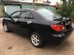 Toyota Corolla altis 1.8G MT 2003 - Bán Toyota Corolla altis 1.8G MT đời 2003, màu đen số sàn, giá chỉ 243 triệu