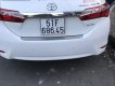 Toyota Corolla   2016 - Bán xe Toyota Corolla năm 2016, màu trắng như mới, giá 650tr