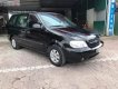 Kia Carnival GS 2.5 MT 2006 - Bán Kia Carnival GS năm 2006, màu đen, động cơ, hộp số hoạt động ổn định, gầm bệ chắc chắn