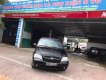 Kia Carnival GS 2006 - Cần bán xe Kia Carnival năm 2006 màu đen, giá chỉ 220 triệu, nhập khẩu