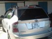 Kia Carens Lx 2010 - Bán xe Kia Carens LX đời 2010, màu bạc