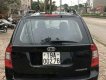 Kia Carens 2009 - Bán Kia Carens năm sản xuất 2009, màu đen giá cạnh tranh