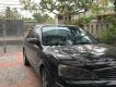 Ford Laser GHIA 1.8 AT 2003 - Bán Ford Laser GHIA 1.8 AT năm sản xuất 2003, màu đen số tự động, giá tốt