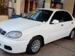 Daewoo Lanos SX 2005 - Cần bán Daewoo Lanos SX sản xuất 2005, màu trắng xe gia đình giá cạnh tranh