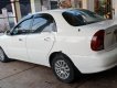 Daewoo Lanos SX 2005 - Cần bán Daewoo Lanos SX sản xuất 2005, màu trắng xe gia đình giá cạnh tranh