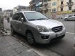 Kia Carens MT 2011 - Cần bán lại xe Kia Carens MT năm 2011, màu bạc xe gia đình