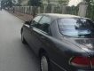 Mazda 626 1996 - Cần bán Mazda 626 đời 1996, màu xám, 95tr