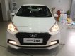 Hyundai Grand i10 1.2  AT 2019 - Bán Hyundai Grand i10 1.2 Sedan AT đời 2019, màu trắng, xe giao ngay