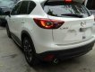 Mazda CX 5    2016 - Gia đình cần bán lại xe Mazda CX5 màu trắng Camay, mua hãng cuối 12/2016, hàng full thắng điện