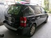 Kia Carnival EX 2.7 MT 2009 - Bán Kia Carnival 2.7 đời 2009, màu đen, nhập khẩu xe gia đình, 380tr