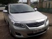 Toyota Corolla altis G 2010 - Cần bán gấp Toyota Corolla altis G sản xuất 2010, màu bạc chính chủ