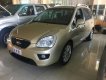 Kia Carens 2014 - Bán Kia Carens sản xuất 2014, màu vàng, 390 triệu