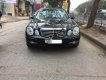 Mercedes-Benz E class E200 2004 - Cần bán lại xe Mercedes E200 sản xuất năm 2004, màu đen 