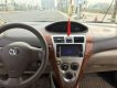 Toyota Vios 2010 - Cần bán Toyota Vios đời 2010, màu đen xe gia đình