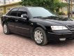 Ford Mondeo 2003 - Cần bán gấp Ford Mondeo sản xuất 2003, màu đen như mới