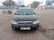 Ford Laser Ghia 2004 - Bán Ford Laser Ghia 2004, màu đen như mới, giá tốt