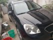 Kia Carens 2011 - Cần bán xe Kia Carens đời 2011, 2.0 AT, màu đen, giá 399tr