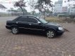 Ford Laser Ghia 2004 - Bán Ford Laser Ghia 2004, màu đen như mới, giá tốt