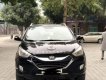 Hyundai Tucson 2009 - Cần bán Hyundai Tucson sản xuất năm 2009, màu đen, xe nhập  