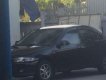 Mazda 323 2001 - Cần bán Mazda 323 sản xuất 2001, màu đen còn mới, giá tốt