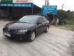 Mazda 3   2004 - Cần bán Mazda 3 năm sản xuất 2004, màu đen, cam kết xe đẹp