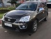 Kia Carens S SX 2.0 MT 2014 - Gia đình cần bán Kia Carens S 2.0 màu nâu, số sàn, sx năm 2014