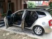 Kia Carens LX 1.6 MT 2010 - Gia đình bán gấp Kia Carens LX 1.6 MT năm 2010, màu vàng