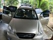 Kia Carens LX 1.6 MT 2010 - Gia đình bán gấp Kia Carens LX 1.6 MT năm 2010, màu vàng