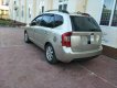 Kia Carens LX 1.6 MT 2010 - Gia đình bán gấp Kia Carens LX 1.6 MT năm 2010, màu vàng