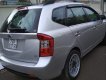 Kia Carens 2010 - Cần bán xe Kia Carens 2010, màu bạc