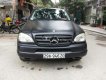 Mercedes-Benz ML Class ML320 2002 - Cần bán gấp xe Mercedes ML320 sản xuất năm 2002, đăng ký lần đầu 2007, số tự động, máy xăng, màu đen