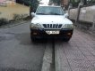 Ssangyong Musso 2004 - Gia đình bán ô tô Ssangyong Musso đời 2004, màu trắng