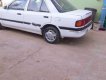 Mazda 323 1.6 MT 1995 - Cần bán Mazda 323 1.6 MT 1995, màu trắng