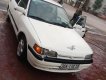 Mazda 323 1.6 MT 1995 - Cần bán Mazda 323 1.6 MT 1995, màu trắng