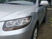 Hyundai Santa Fe   MLX 2006 - Cần bán Hyundai Santa Fe MLX năm sản xuất 2006, màu bạc, nguyên bản từ A đến Z