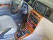 Toyota Corolla altis 1.8 2003 - Cần bán Toyota Corolla Altis 1.8 năm 2003, màu trắng, 225tr