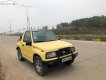 Chevrolet Tracker 1993 - Cần bán Chevrolet Tracker sản xuất 1993, màu vàng, nhập khẩu