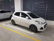 Hyundai Grand i10 1.0 MT 2015 - Cần bán lại xe Hyundai Grand i10 1.0 MT 2015, màu trắng, giá 290tr