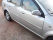 Daewoo Lacetti EX 2004 - Cần bán Daewoo Lacetti EX đời 2004, màu bạc