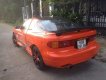 Toyota Celica 1989 - Gia đình bán Toyota Celica 1989 màu cam, giá 295tr