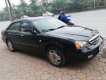 Daewoo Magnus  2.5 AT   2004 - Cần bán Magnus 2.5 số tự động, đăng kí 2004